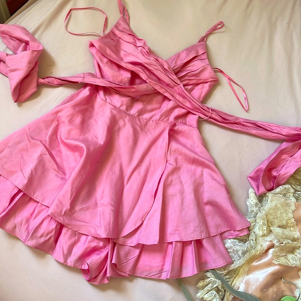 Pink romper in size S, brand mustard seed